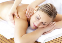 massage therapist with patient